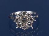 une image représentant une bague en diamant sur un fond bleu