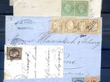 many old letters on a piece of paper hanging on a wall