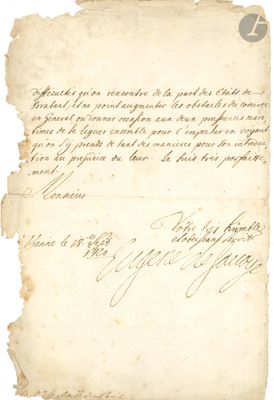 une vieille lettre écrite à l'encre noire sur un morceau de papier