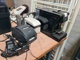many different types of electronic equipment on the table