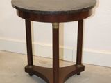 an image of a round table with a marble top
