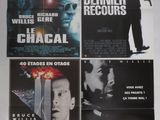 trois affiches de cinéma représentant un homme tenant un pistolet à la main