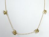 gold plated necklace with three birds on a gold chain
