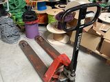 a picture of a cluttered garage with tools and supplies