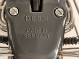 a close up of a metal object with a number on it