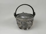 an antique silver teapot with a handle and a handle