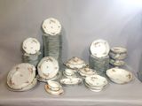 a lot of plates that are sitting on a table