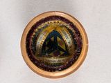 a picture of a picture of a badge on a wall