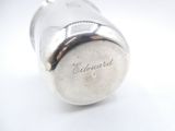 an image of a close up of a metal object on a white surface