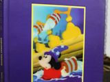 an image of a purple book with a picture of a mickey mouse on it