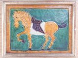 une photo d'un tableau représentant un cheval accroché au mur