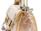 louis vu vu bag with gold trim and crystals on the handle