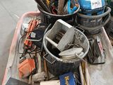 a tray of tools and tools sitting on the floor