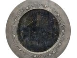 a silver plate with a clock on it on a white background