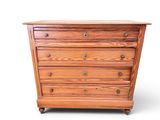an image of a wooden chest of drawers on a white background
