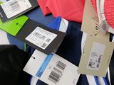 a pile of clothing that is sitting on a table