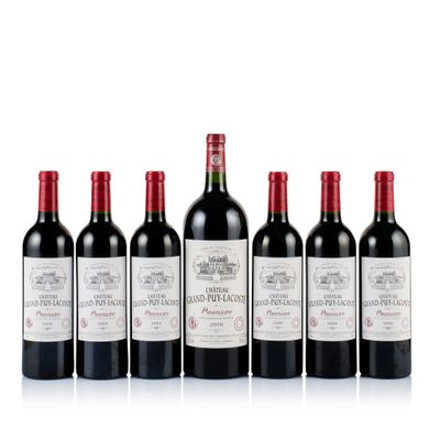 six bottles of red wine lined up in a row