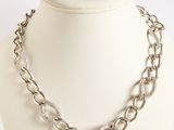 silver plated chain link necklace on a mannequin