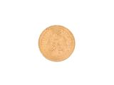 a close up of a gold coin on a white background