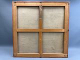 an old wooden window with a glass pane in it