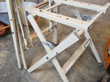 several pieces of wood sit on top of a table in a workshop