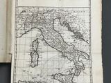an old book with a map of italy on it