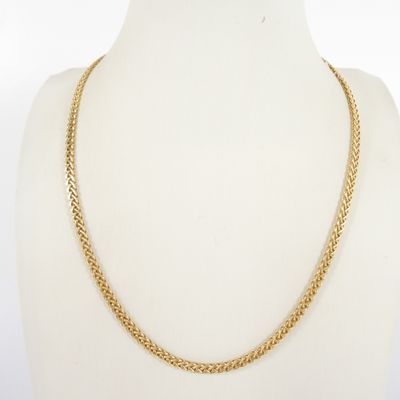 a gold chain necklace on a mannequin mannequin mannequin mannequin mannequin mannequin mannequin mannequin manne