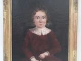 portrait d'une jeune fille en robe rouge, dans un cadre doré