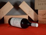 a bottle of wine that is sitting on a table