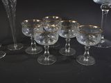 a group of wine glasses that are sitting on a table