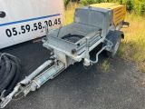 a trailer with a trailer attached to it and a trailer with a trailer attached to it