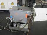 a machine that is sitting on a table in a room