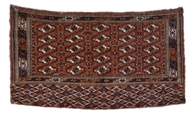 a brown and black rug on a white background