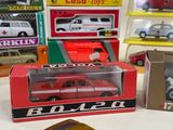 a lot of toy cars that are sitting on a table
