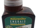 une image d'une bouteille d'engrais sur fond blanc