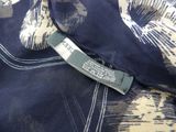 an image of a close up of a label on a shirt