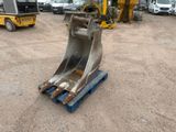 a picture of a large metal bucket on a pallet