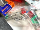 a plastic bag with various items in it sitting on a table