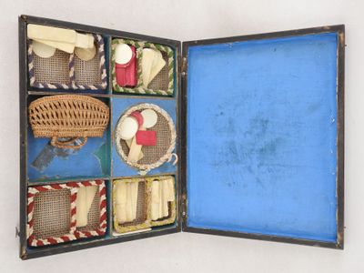 a blue box with a bunch of items inside of it