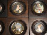 six framed pictures of a woman and a child in a wood frame