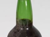 a bottle of liquor that is sitting on a table