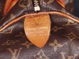 a close up view of a louis vuitton bag