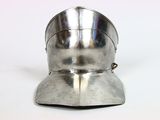 a silver helmet on a white surface
