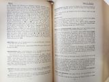 an open book that is sitting on a table
