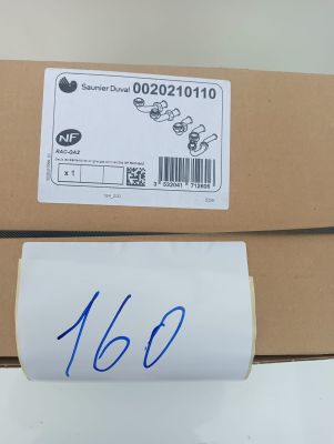 two boxes with a sticker on them sitting on top of a table