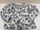 a white and blue shirt with blue birds on it