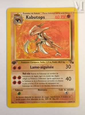 a close up of a pokemon card on a white surface