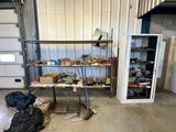 a garage with a lot of clutter and tools in it