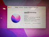 a computer screen with a picture of a macos monkey on it