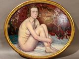 painting of a nude woman sitting on a bed in a gold frame